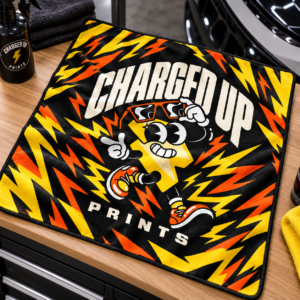 Custom printed microfiber towel on a workbench